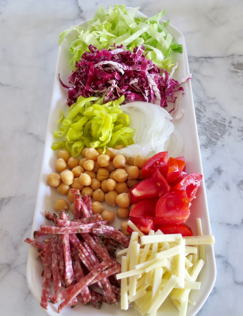 Iceberg Lettuce, Radicchio, Pepperoncini, Onion, Chickpeas, Tomato, Salami & Cheese