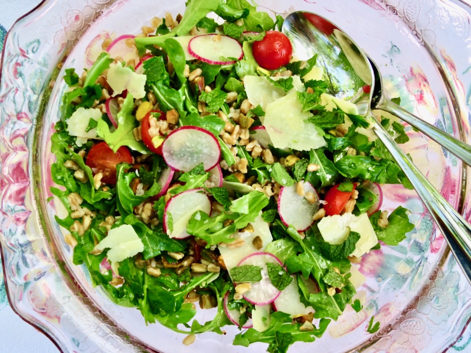 Sugar snap pea salad with shaved onion, radish, basil, and mint